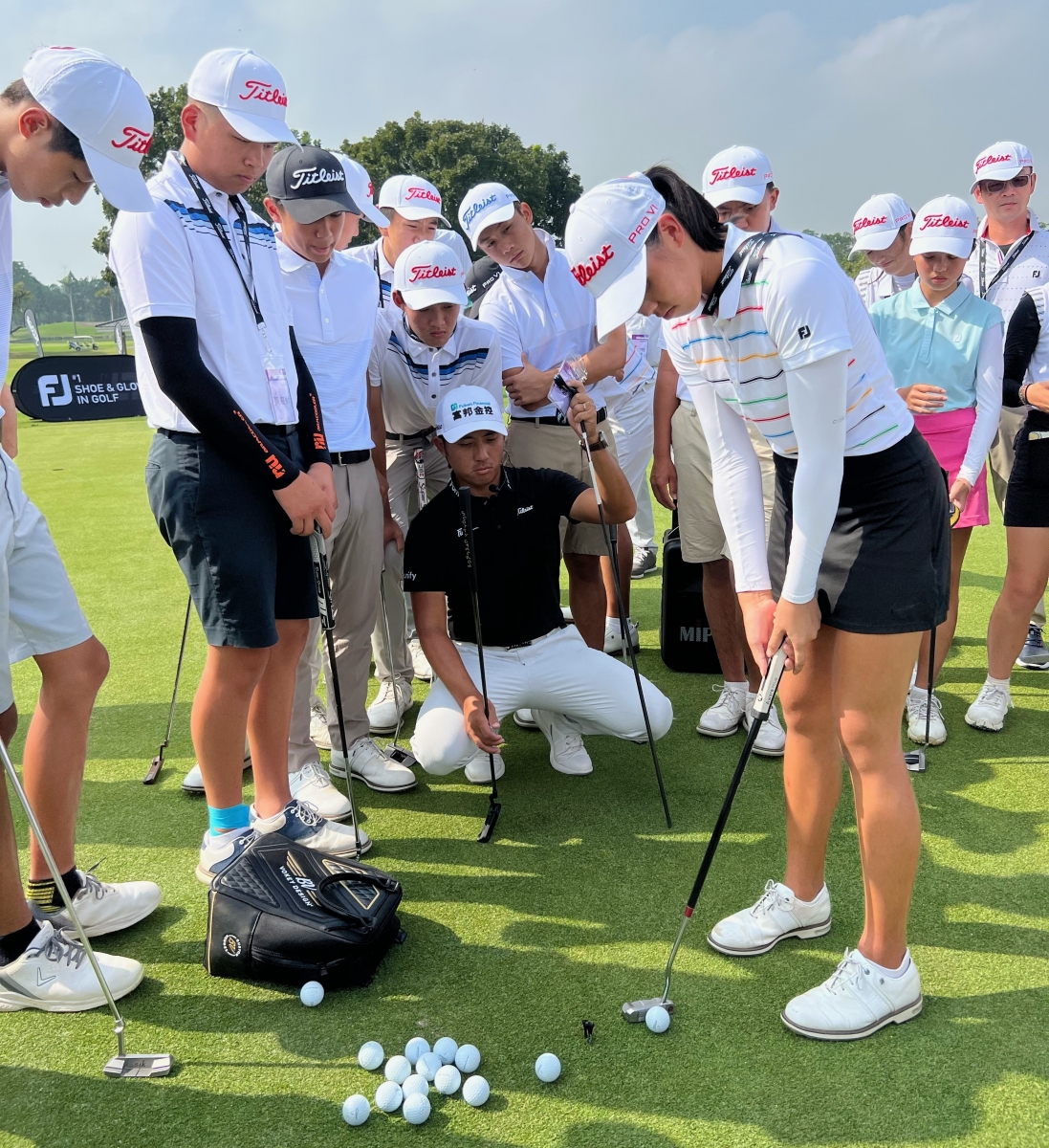 C.T. Pan during a junior golf camp in Taipei